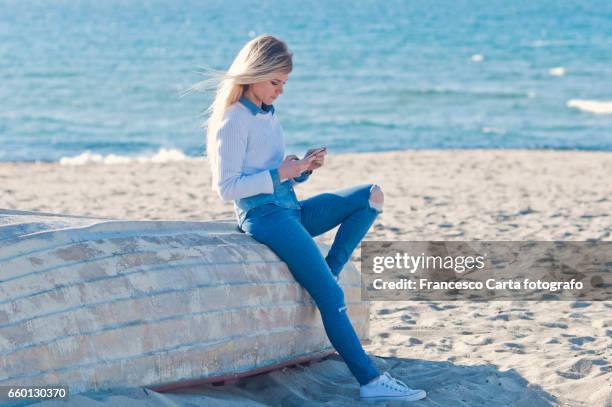 springtime on the beach - telefono stock pictures, royalty-free photos & images