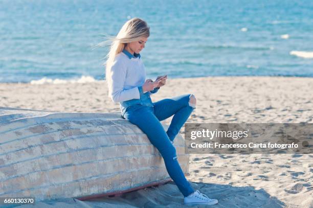 springtime on the beach - telefono cellulare stock pictures, royalty-free photos & images