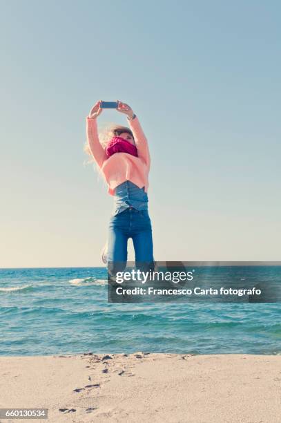 springtime on the beach - gente comune stockfoto's en -beelden