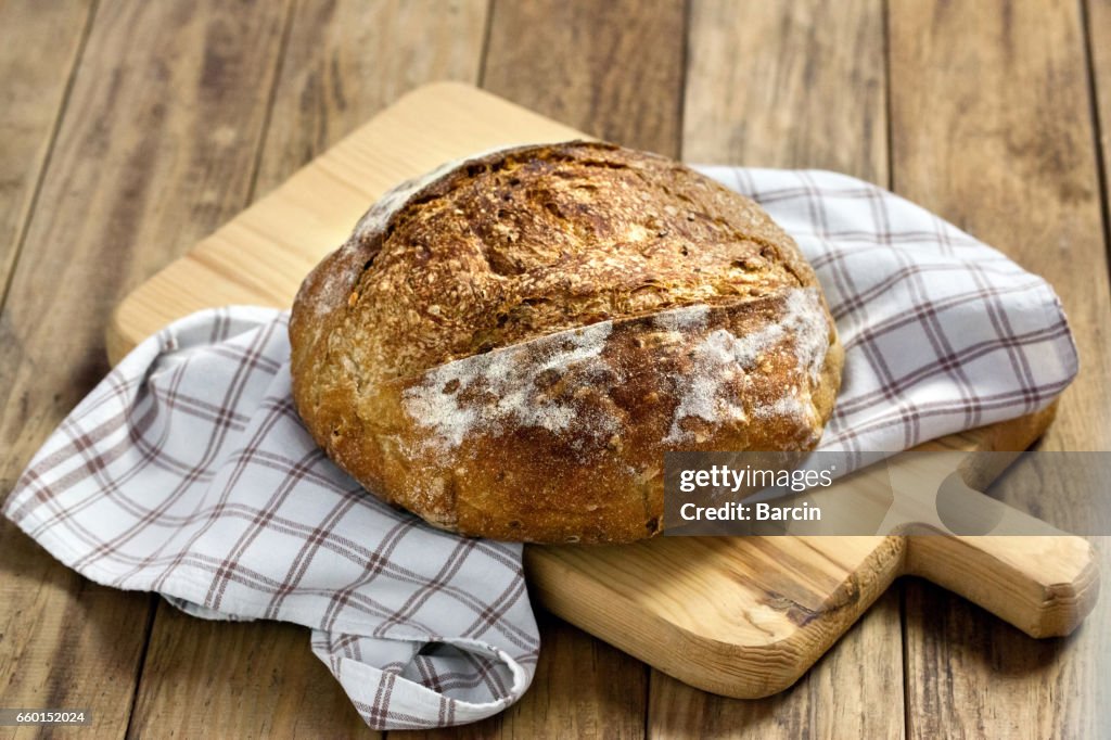 Load of bread on cutting board