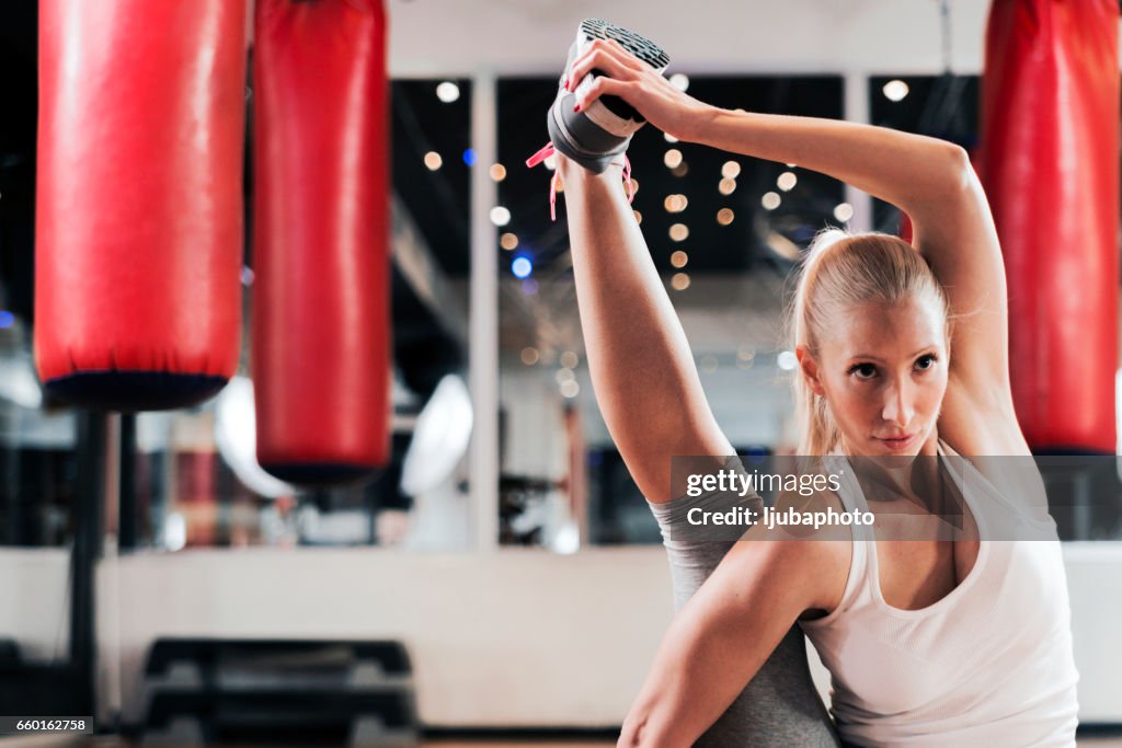 She's a fitness enthusiast, Working out her legs