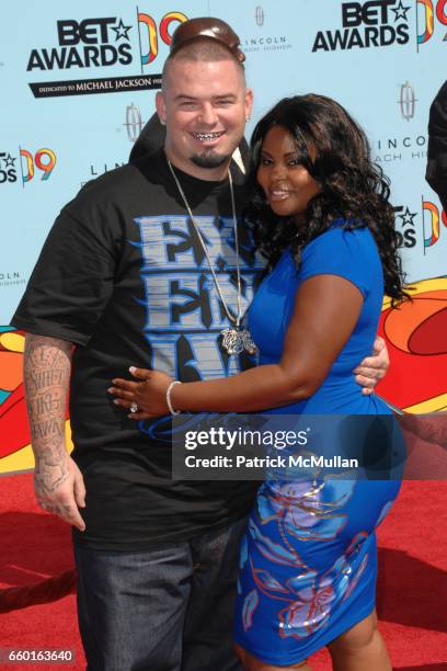 Paul Wall and Guest attend 2009 BET Awards - Red Carpet at The Shrine Auditorium on June 28, 2009 in Los Angeles, California.