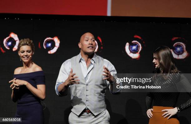 Kelly Rohrbach, Dwayne Johnson and Alexandra Daddario speak at Paramount Pictures' presentation highlighting its 2017 summer and beyond during...