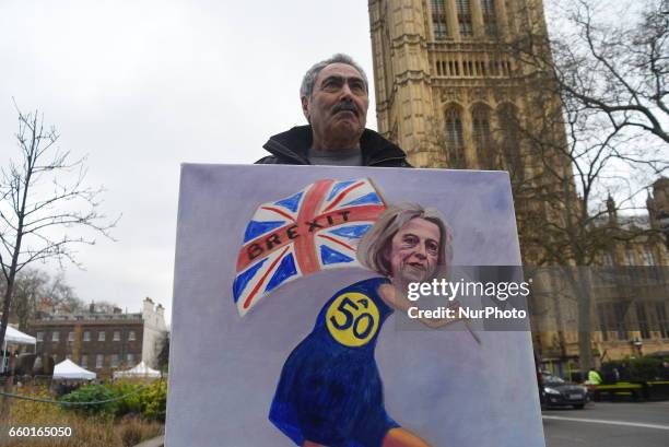 Anti-Brexit demonstrators show EU flags outside Downing Street and the Houses of Parliament, London on March 29, 2017. The Government has triggered...