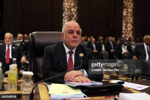 Iraqi prime minister Haidar Al-Abadi attends during the Arab League summit in the Jordanian Dead Sea resort of Sweymah, Jordan, March 29, 2017. Arab...