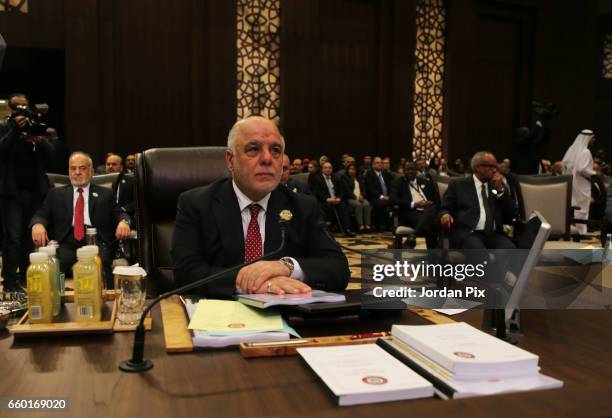 Iraqi prime minister Haidar Al-Abadi attends during the Arab League summit in the Jordanian Dead Sea resort of Sweymah, Jordan, March 29, 2017. Arab...