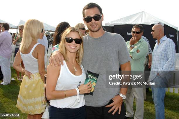 Laura Katzenberg and Mark Sudack attend popchips at the Mercedes-Benz Polo Challenge at Two Trees Farm on July 18, 2009 in Bridgehampton, New York.