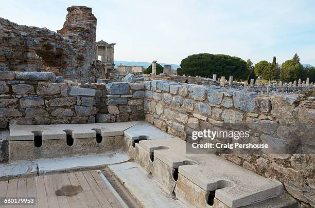 men's latrines, ephesus. - baños públicos fotografías e imágenes de stock