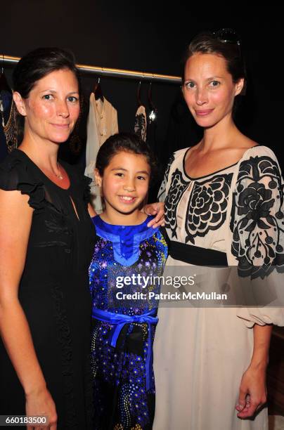 Kelly Burns, Cameron Carter and Christy Turlington attend TEMPERLEY London and CHRISTY TURLINGTON host Shop For CARE at Temperley East Hampton NY on...