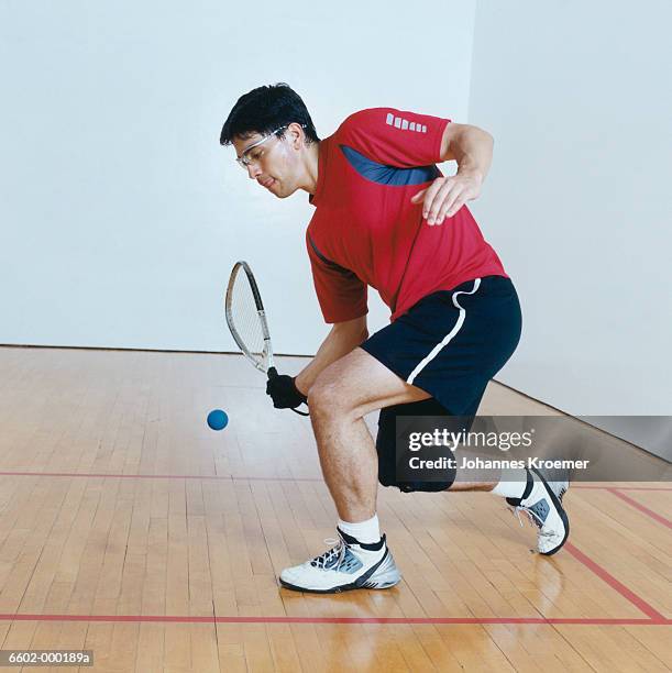 man playing racketball - racketball stock pictures, royalty-free photos & images