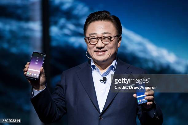 Koh, president of mobile communications business at Samsung, introduces the new Samsung Galaxy S8 during a launch event, March 29, 2017 in New York...