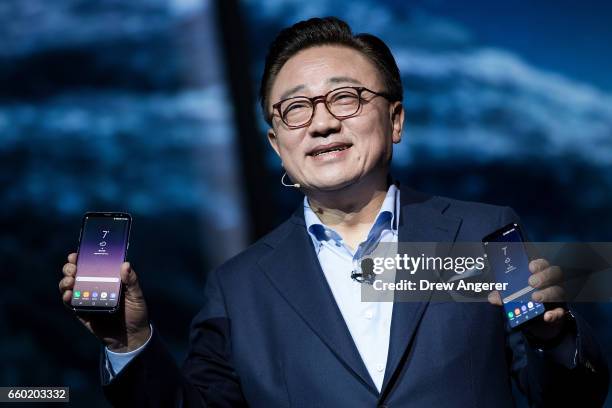 Koh, president of mobile communications business at Samsung, introduces the new Samsung Galaxy S8 during a launch event, March 29, 2017 in New York...