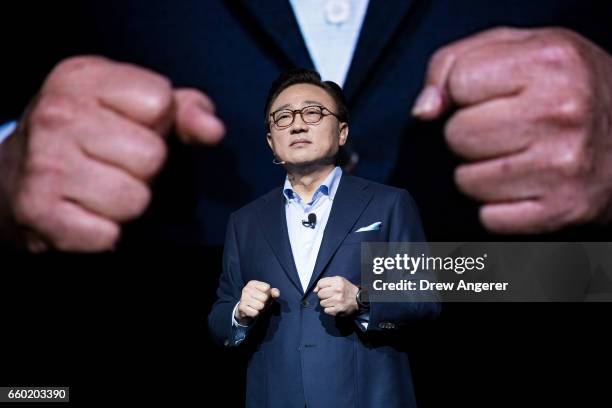 Koh, president of mobile communications business at Samsung, speaks as he prepares to introduce the new Samsung Galaxy S8 during a launch event,...