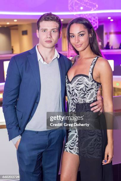 Actors Oliver Stark and Hannah Gottesman attend the Fathom Events And Terra Mater Film Studios Premiere Event For "MindGamers: One Thousand Minds...