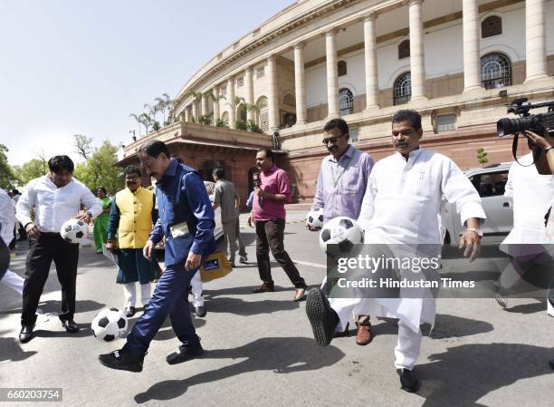 Prasun Banerjee, MP , with O.P. Yadav, BJP MP from Siwan, and other Members of Parliament playing football after Lok Sabha Speaker Sumitra Mahajan...