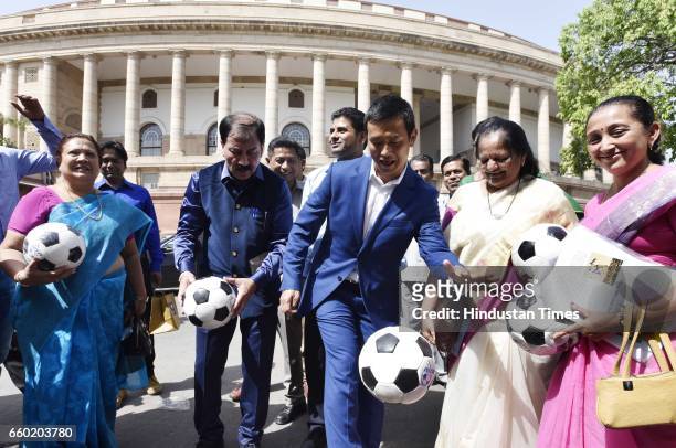 Prasun Banerjee, MP , with Bhaichung Bhutia and other Members of Parliament playing football after Lok Sabha Speaker Sumitra Mahajan presented...