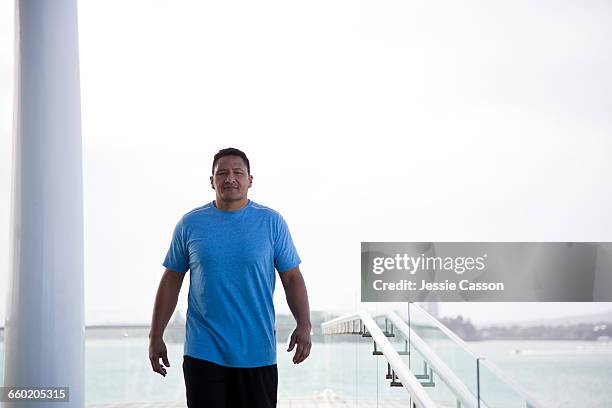 maori man stands on walkway - photohui stock pictures, royalty-free photos & images