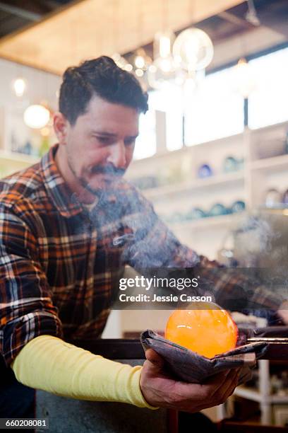 glass blowers in studio - glass blowing stock pictures, royalty-free photos & images