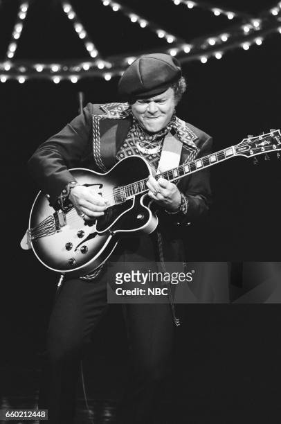 Pictured: Musician Roy Clark performing on August 4th, 1976--