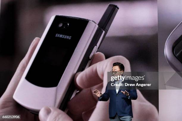 Koh, president of mobile communications business at Samsung, speaks as he prepares to introduce the new Samsung Galaxy S8 during a launch event,...