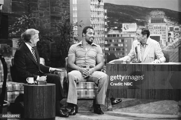 Pictured: Announcer Ed McMahon and Boxer Ken Norton during an interview with Guest Host Joey Bishop on August 10th, 1976--
