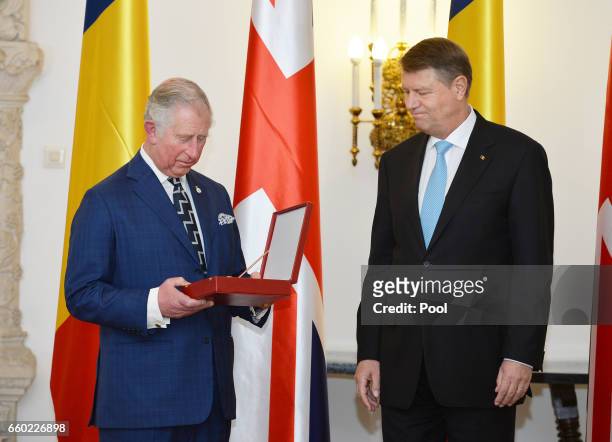 Prince Charles, Prince of Wales receives the Order of the Star of Romania The Grand Cross from President of Romania Klaus Iohannis at the Palace of...