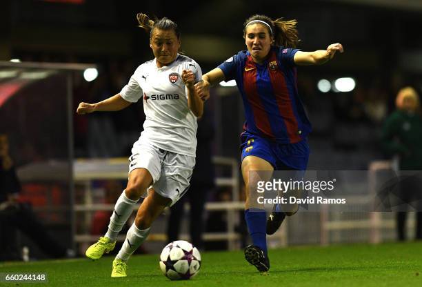 Ali Riley of Rosengard and Mariona Caldentey of Barcelona during the UEFA Women's Champions League Quarter-Final Second Leg match between Barcelona...