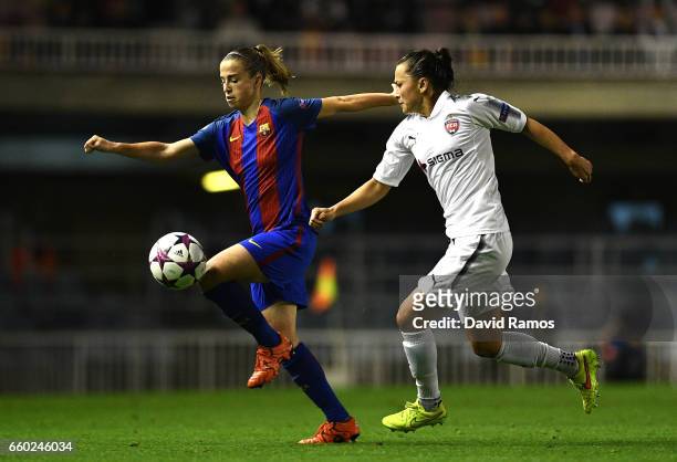 Marta Torrejon of Barcelona and Ali Riley of Rosengard in action during the UEFA Women's Champions League Quarter-Final Second Leg match between...