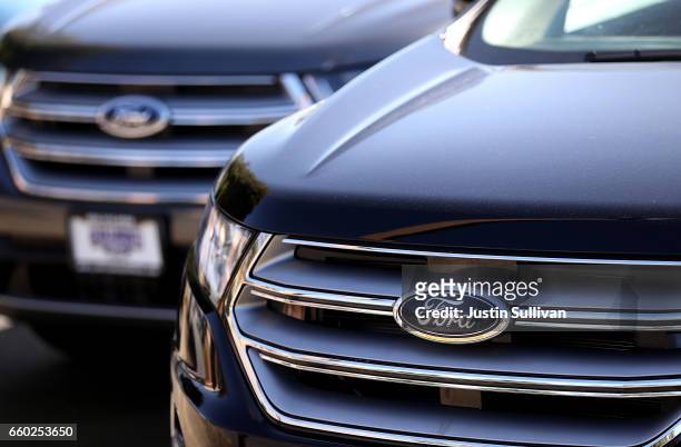 The Ford logo is displayed on a new Ford car on the sales lot at a Ford dealership on March 29, 2017 in Colma, California. Ford announced that it is...