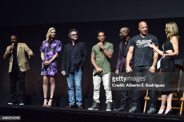 Director F. Gary Gray, actors Charlize Theron, Kurt Russell, Ludacris, Tyrese Gibson, Vin Diesel, and moderator Natalie Morales speak onstage at...