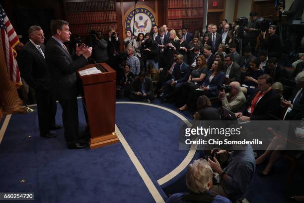 Senate Intelligence Committee Chairman Richard Burr and ranking member Sen. Mark Warner hold a news conference about the committee's investigation...