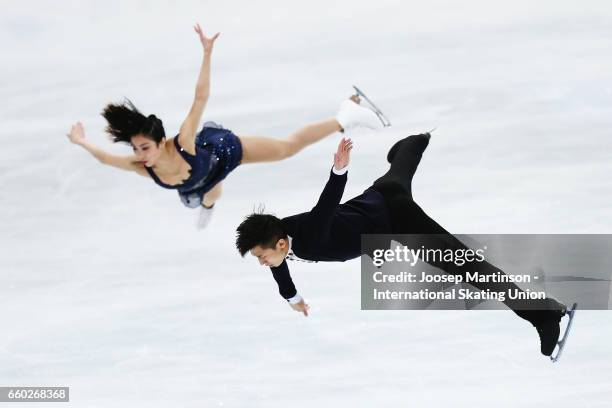 Wenjing Sui and Cong Han of China compete in the Pairs Short Program during day one of the World Figure Skating Championships at Hartwall Arena on...