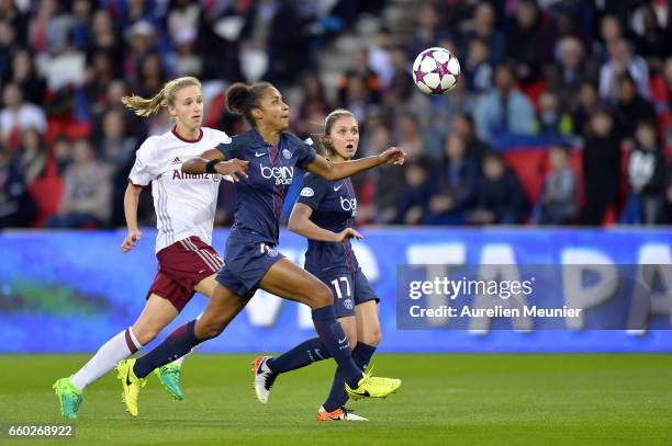 Laura Georges of Paris Saint Germain competes for the ball during the Champions League match between Paris Saint Germain and Bayern Munich at Parc...