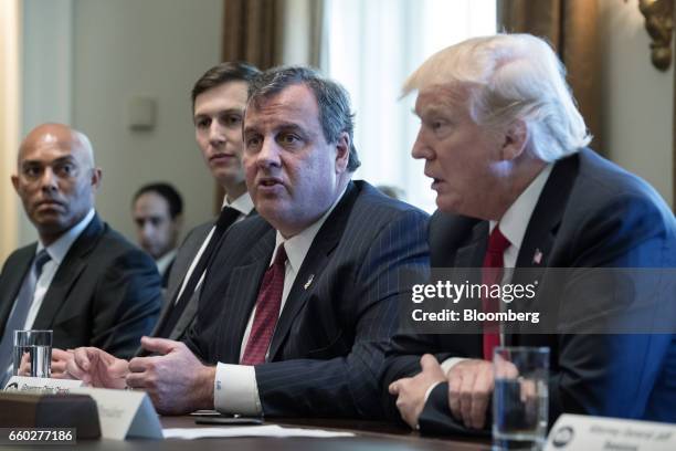 New Jersey Governor Chris Christie, center, speaks while U.S. President Donald Trump listens during an opioid and drug abuse listening session in the...