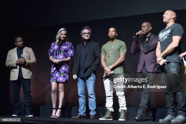 Director F. Gary Gray, actors Charlize Theron, Kurt Russell, Ludacris, Tyrese Gibson, and Vin Diesel speak onstage at CinemaCon 2017 Universal...