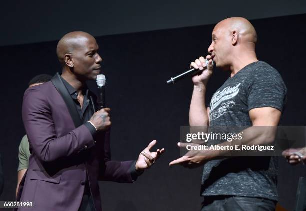 Actors Tyrese Gibson and Vin Diesel speak onstage at CinemaCon 2017 Universal Pictures Invites You to a Special Presentation Featuring Footage from...