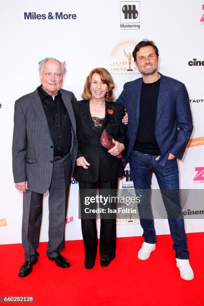 Austrian actress Senta Berger with her husband producer Michael Verhoeven and her son Simon Verhoeven attend the Jupiter Award at Cafe Moskau on...