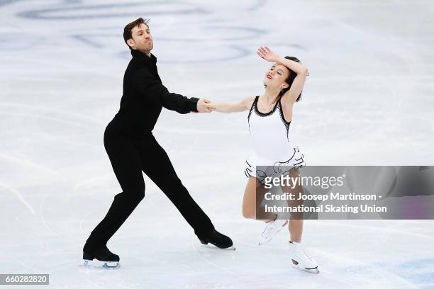 Liubov Ilyushechkina and Dylan Moscovitch of Canada compete in the Pairs Short Program during day one of the World Figure Skating Championships at...