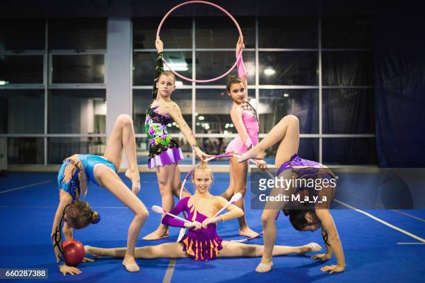 rhythmic gymnastics girls - rhythmic gymnastics stock pictures, royalty-free photos & images