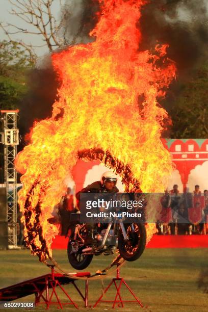 Indian army jawan showing his skills during the Army Pageant &amp; Air Force Show on the eve of Rajasthan day celebration at Polo Ground in Jaipur on...