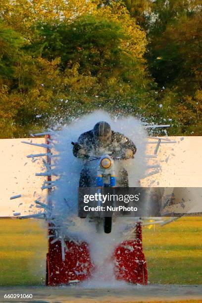 Indian army jawan showing his skills during the Army Pageant &amp; Air Force Show on the eve of Rajasthan day celebration at Polo Ground in Jaipur on...