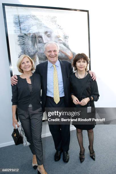 Alain Flammarion standing between his wife Suzanna Flammarion and galerist Nathalie Obadia attend the 'Art Paris Art Fair' Exhibition Opening at Le...