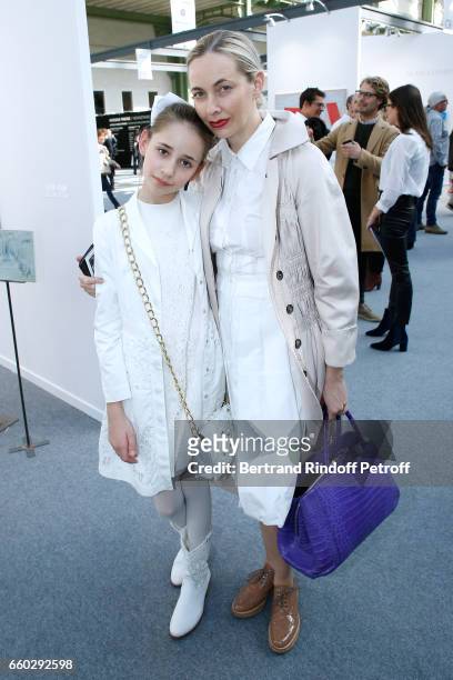 Melonie Hennessy Foster and her daughter Savannah attend the 'Art Paris Art Fair' Exhibition Opening at Le Grand Palais on March 29, 2017 in Paris,...