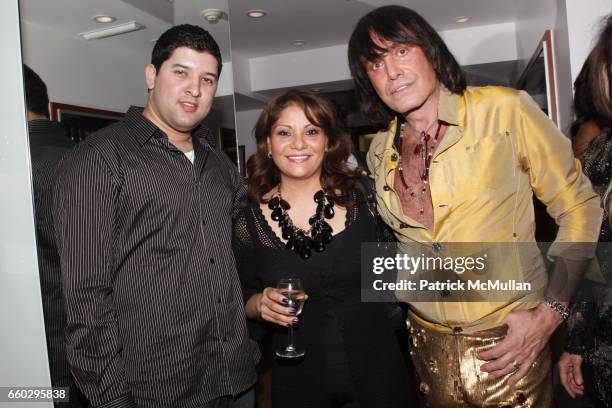 Johnny Rivera, Ava Martinez and Rodolfo Valentin attend RODOLFO VALENTIN'S Salon & Spa Preview Party at 694 Madison Avenue on June 15, 2009 in New...