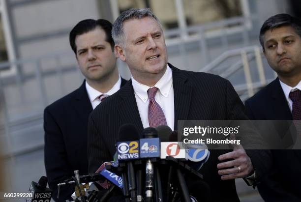 William Fitzpatrick, acting U.S. Attorney for the District of New Jersey, peaks to members of the media outside federal court after sentencing in...