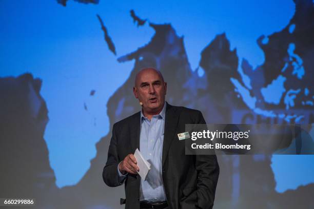 Hugh Grant, chairman and chief executive officer for Monsanto Co., speaks during the Global Agribusiness Forum in Sao Paulo, Brazil, on Wednesday,...