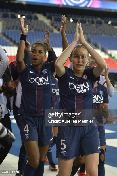 Sabrina Delannoy and Laura Georges of Paris Saint Germain in react after the victory after the Champions League match between Paris Saint Germain and...