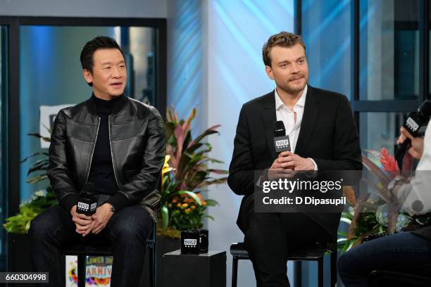 Chin Han and Pilou Asbaek attend the Build Series to discuss "Ghost in the Shell" at Build Studio on March 29, 2017 in New York City.