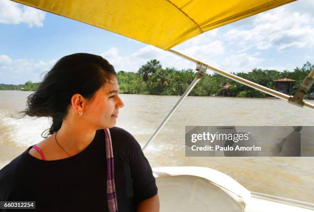 a young girl enjoying the view in amazon,brazil - amazon jungle girl stockfoto's en -beelden