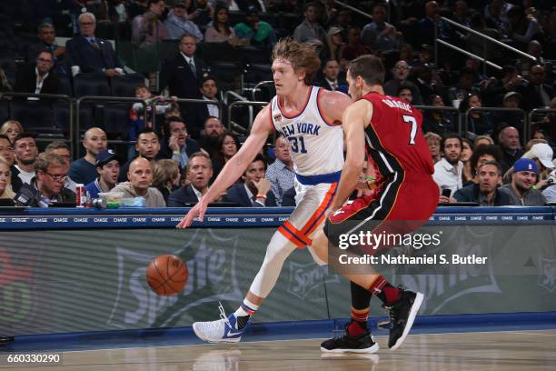 Ron Baker of the New York Knicks handles the ball against the Miami Heat on March 29, 2017 at Madison Square Garden in New York City, New York. NOTE...